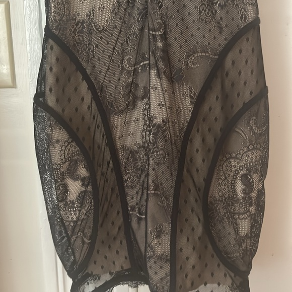 Bebe size small Lacey black tight dress. Zipper works. Never been worn! - Picture 3 of 5